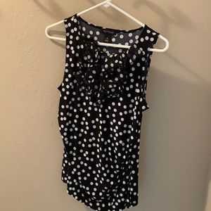 Women’s ruffled sleeveless top